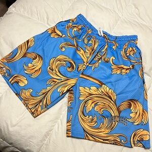 Who Cares basketball shorts- Blue with Gold Baroque Pattern